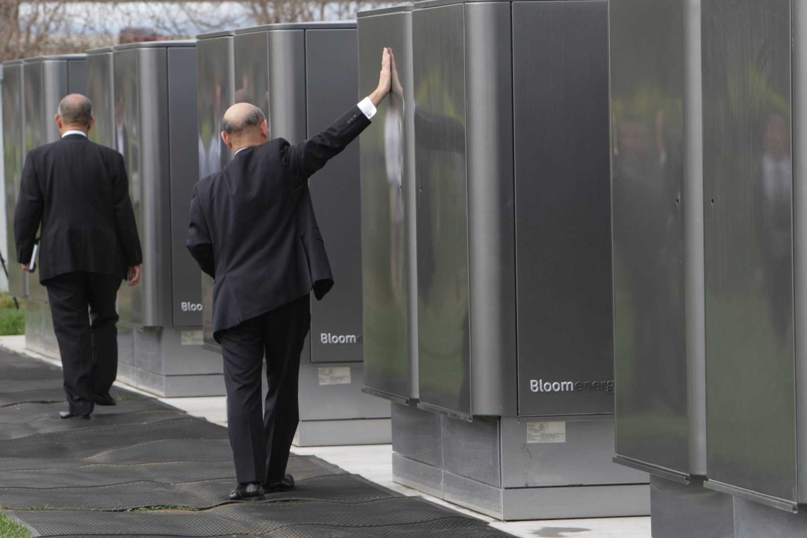 Guests touching a Bloom Energy Server at the 2010 launch event